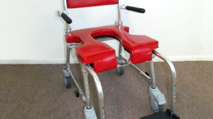 photo of a red Go! shower and commode chair