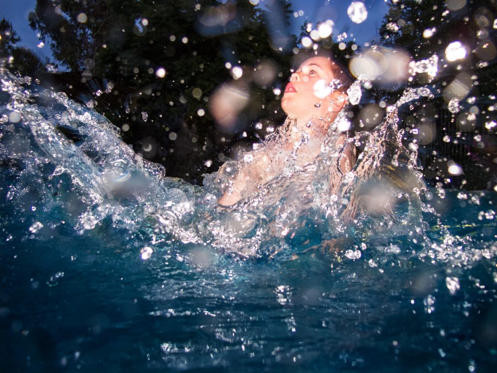 Bruce's son playing in water.