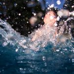 Bruce's son playing in water.