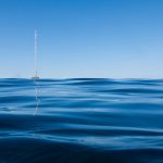 photo of a boat presumably in the ocean.