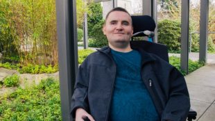 photo of chris schlechty, a microsoft employee in his wheelchair.