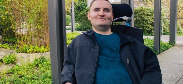 photo of chris schlechty, a microsoft employee in his wheelchair.