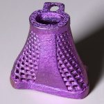 3d printed titanium vertebrae. It is painted purple.