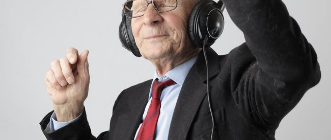 man in black jacket wearing black headphones