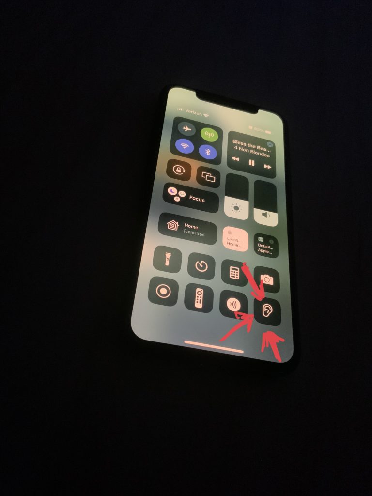 Image of an iPhone X’s command center highlighting the new background sounds icon.