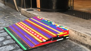 A colorful wheelchair ramp made from lego bricks