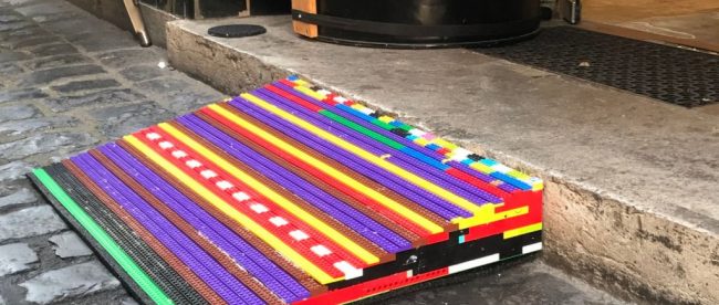 A colorful wheelchair ramp made from lego bricks