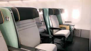 a gif showing air 4 all - a regular airplane seat folds and makes way for a powered wheelchair