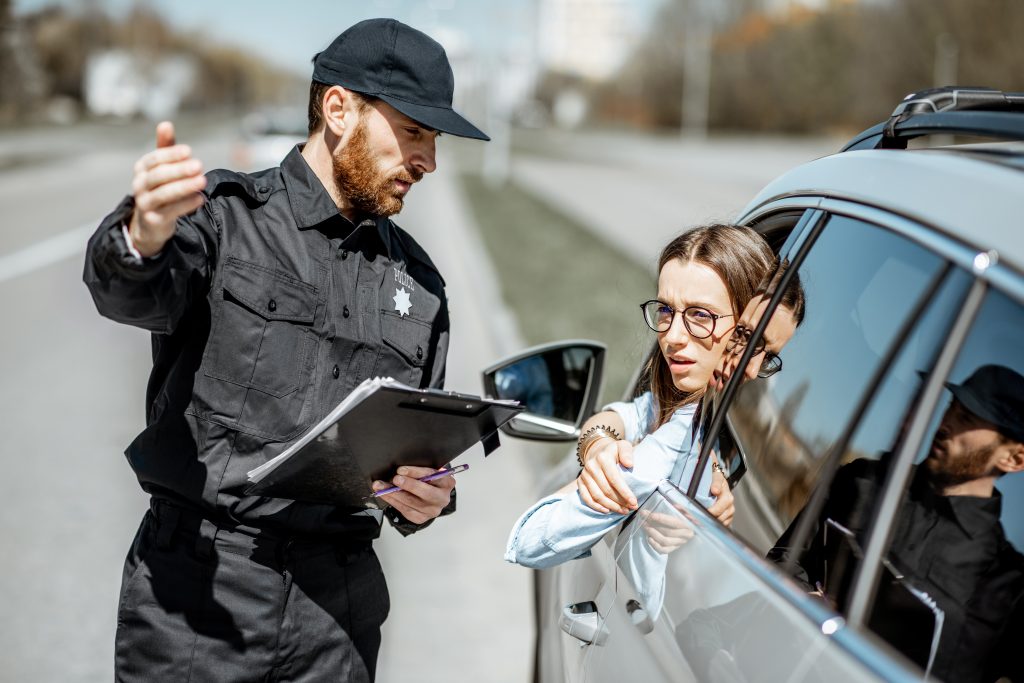 police officer seen talking to a car driver