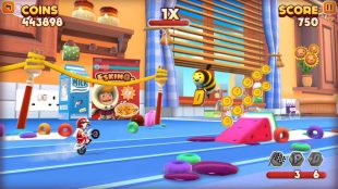 screenshot from Joe danger. Joe is seen doing a wheelie on his motorcycle just about to go up a ramp to collect coins