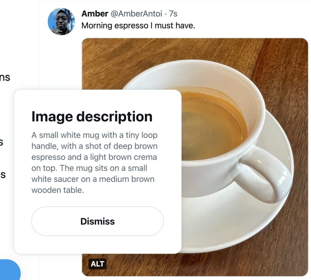 An image of a cup and saucer with beverage in it displayed inside a tweet with an overlay of image description where at text for this image has been added.