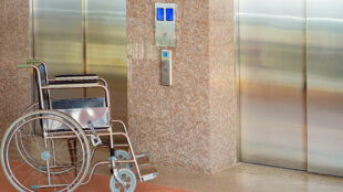 a wheelchair outside an elevator