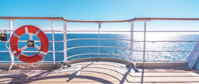 Cruise Ship Wooden Deck and Lifebuoy Ling. Ocean Liner Theme.